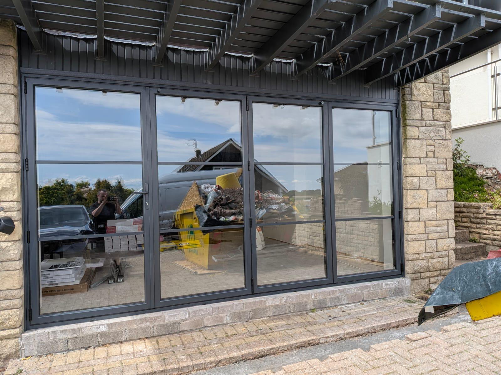 Aluminium bi-fold doors on a modern extension