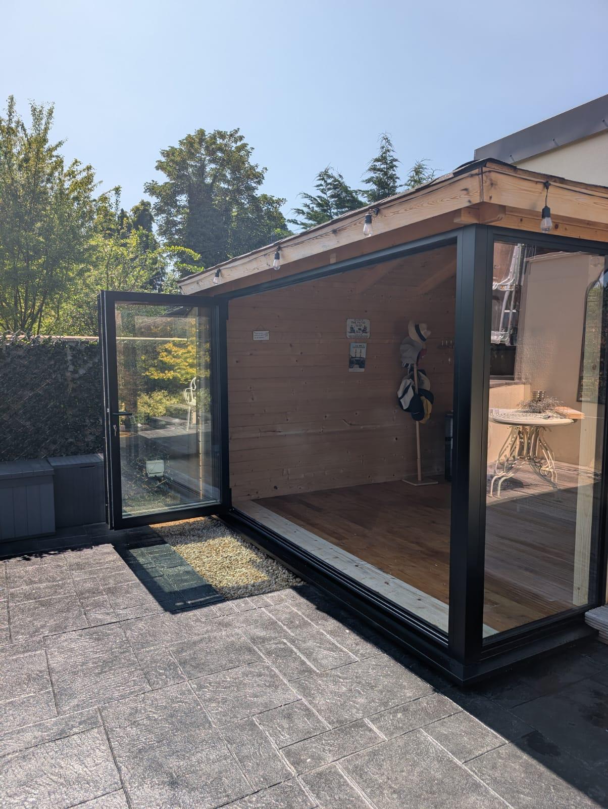 Aluminium Bi-folds installation by Essential Glazing Products
