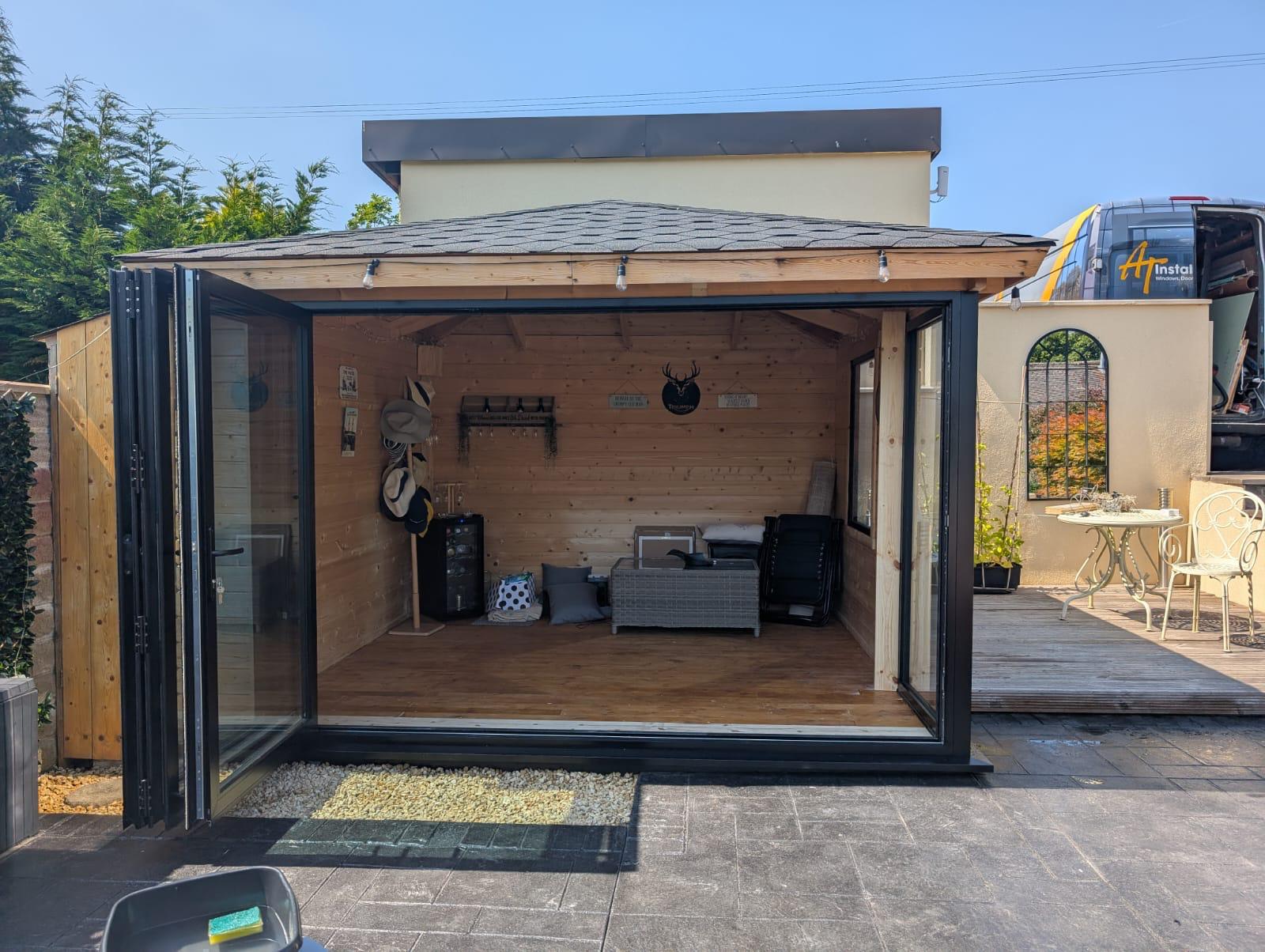 Aluminium Bi-folds installation by Essential Glazing Products