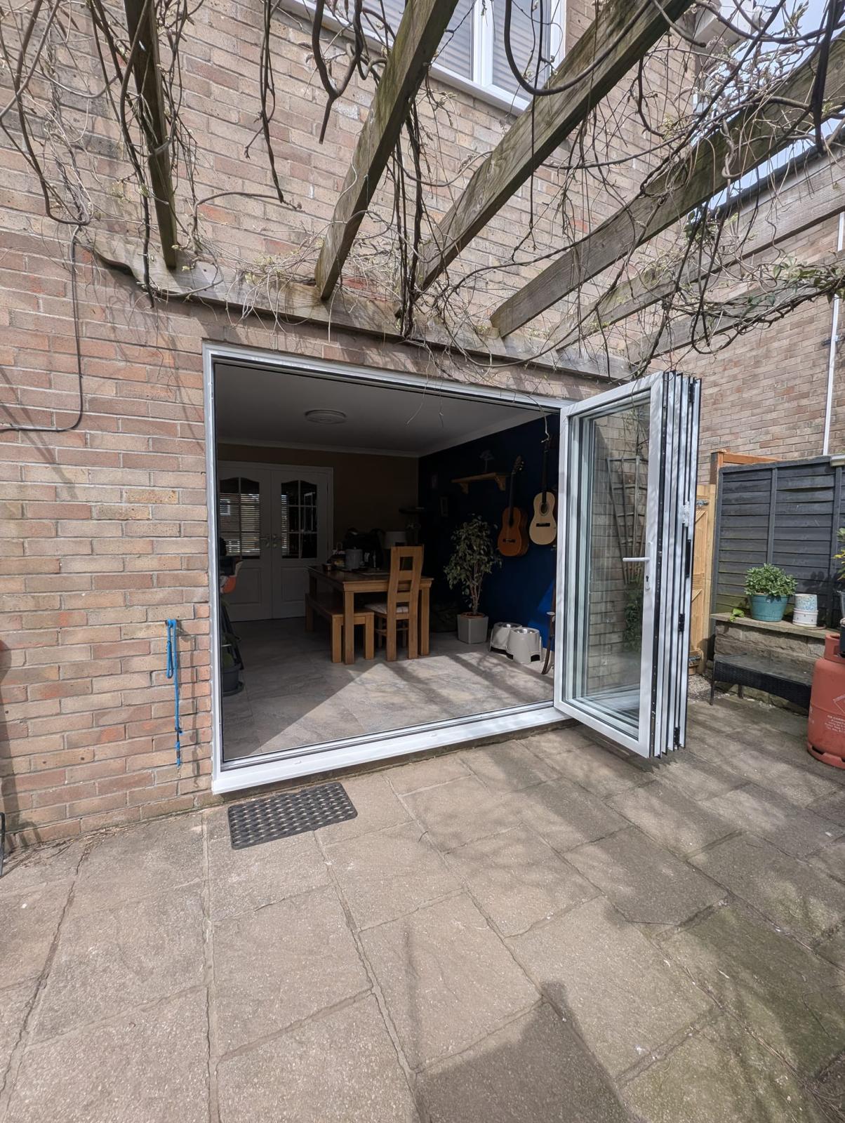 uPVC Bi-folds installation by Essential Glazing Products