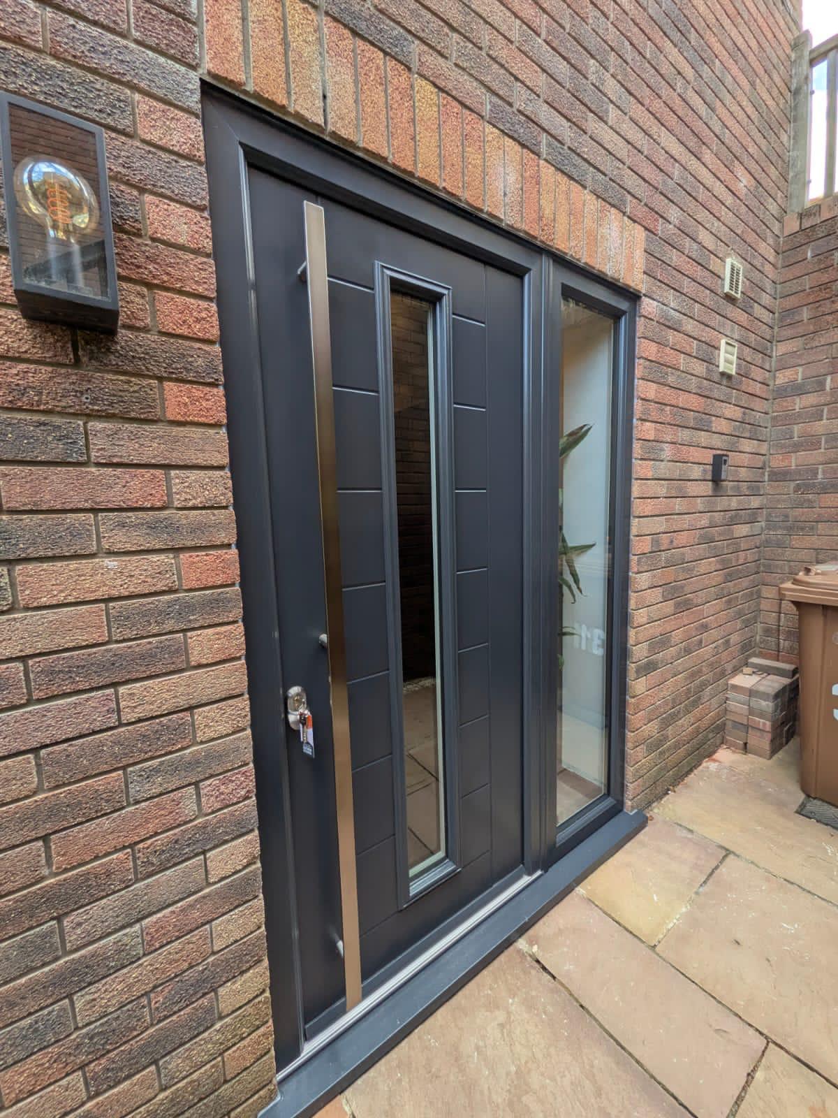 Aluminium Doors installation by Essential Glazing Products